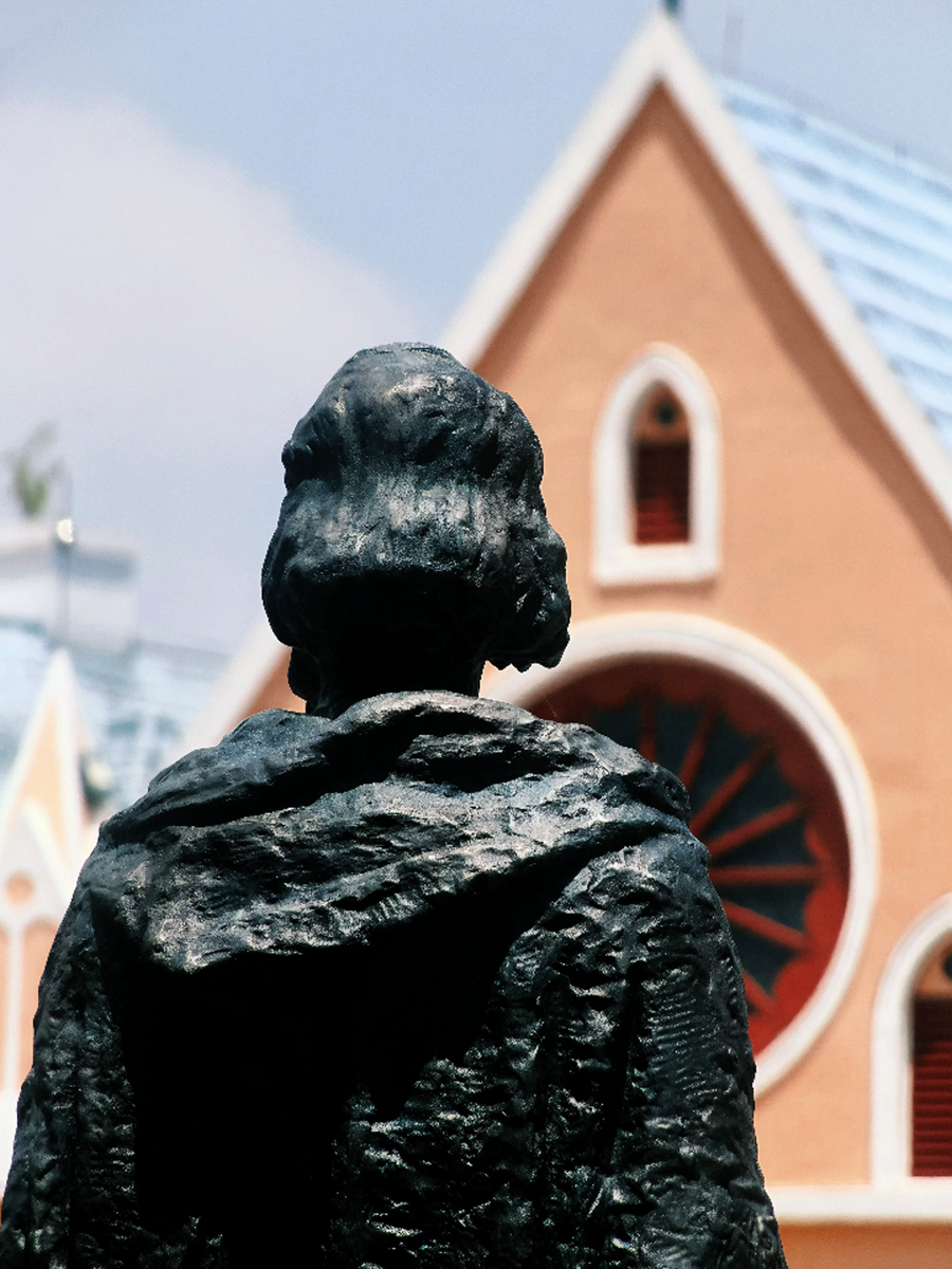 With Lens — Statue
