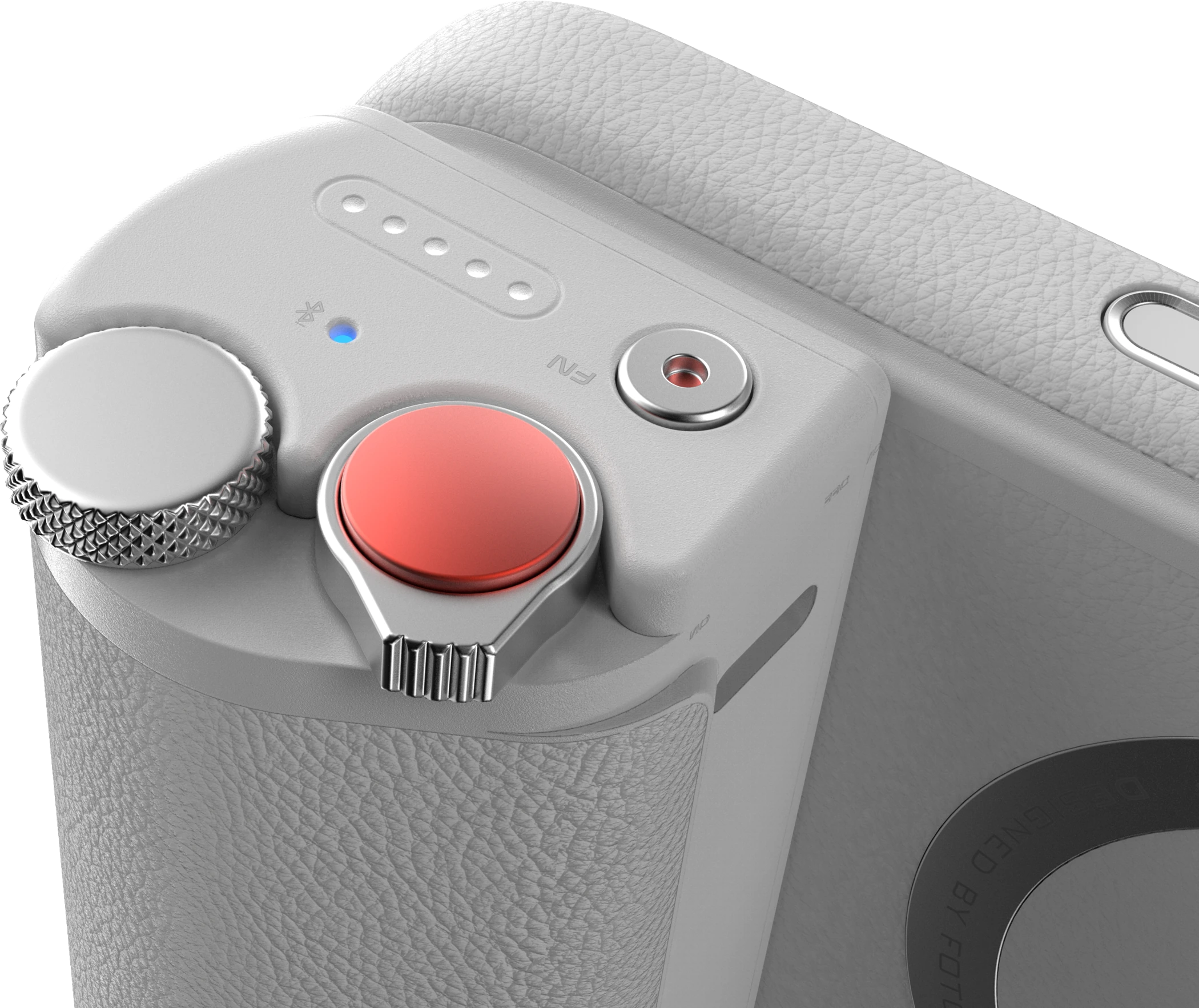 Red button and control dial on the photography grip